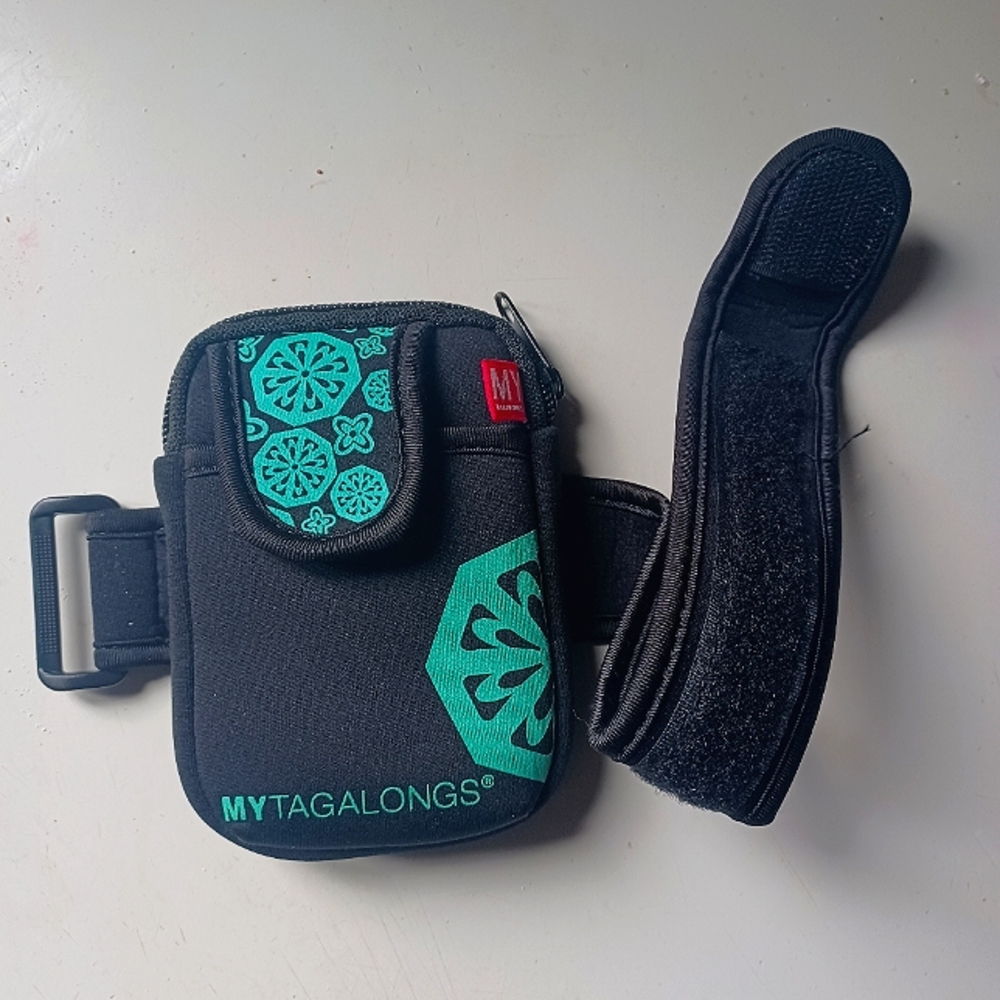 My Tagalongs hands free armband for jogging and exercising.